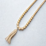 Load image into Gallery viewer, Tassel Ball Necklace Cream
