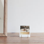 Load image into Gallery viewer, SMALL BRASS STAND FOR PHONE OR PHOTOS
