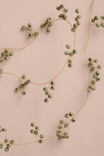 Load image into Gallery viewer, Wire String with Green Wooden Beads
